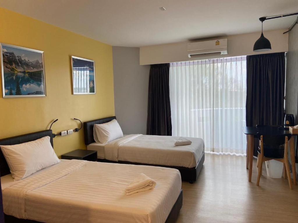 Dluxx Thammasat Hotel Pathum Thani Bagian luar foto